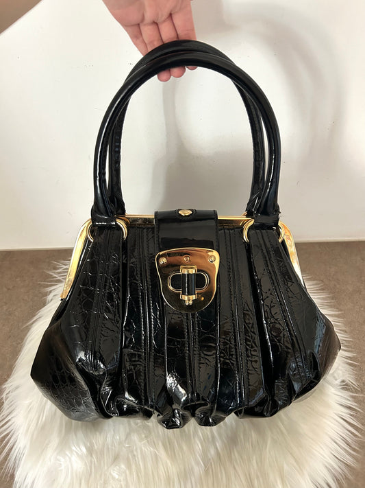 Alexander McQueen Elvie in vernice nera